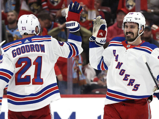 SUNRISE, FLORIDA - MAY 26: Chris Kreider #20 and Barclay Goodrow #21 of the New York Rangers celebrate after defeating the Florida Panthers in overtime during Game Three of the Eastern Conference Final of the 2024 Stanley Cup Playoffs at Amerant Bank Arena on May 26, 2024 in Sunrise, Florida.