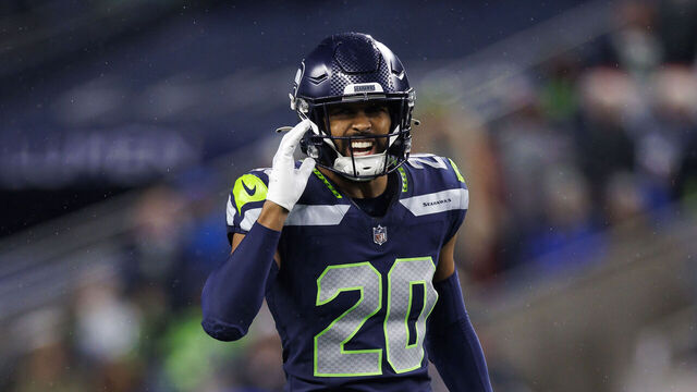 SEATTLE, WASHINGTON - DECEMBER 18: Julian Love #20 of the Seattle Seahawks defends in coverage against the Philadelphia Eagles at Lumen Field on December 18, 2023 in Seattle, Washington.