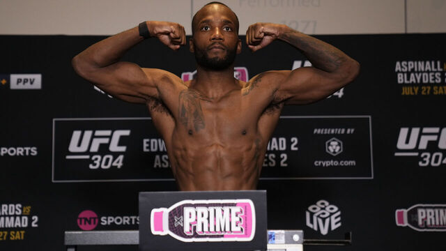 MANCHESTER, ENGLAND - JULY 26: Leon Edwards of Jamaica poses on the scale during the UFC 304 official weigh-in at the Radisson Edwardian hotel on July 26, 2024 in Manchester, England.