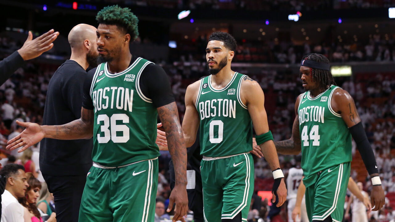 Miami, FL - May 23: Boston Celtics, from left, Marcus Smart, Jayson Tatum and Robert Williams III head to the bench in the fourth quarter. The Celtics beat the Miami Heat, 116-99, in Game 4 of the 2023 Eastern Conference Finals.