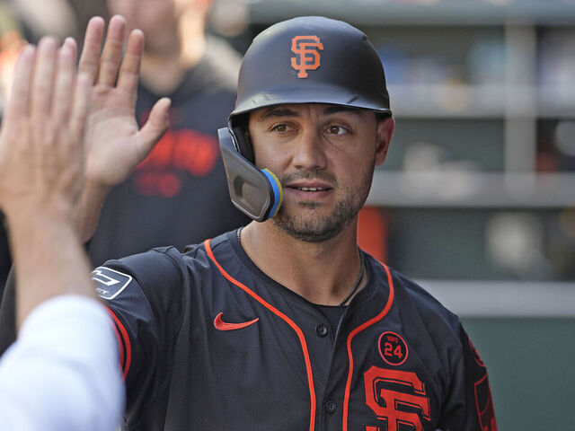 SAN FRANCISCO, CALIFORNIA - JULY 13: Michael Conforto #8 of the San Francisco Giants high fives teammates at Oracle Park on July 13, 2024 in San Francisco, California.