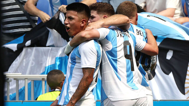 LYON, FRANCE - JULY 27: Thiago Almada #10 of Team Argentina celebrates scoring his team's first goal during the Men's group B match between Argentina and Iraq during the Olympic Games Paris 2024 at Stade de Lyon on July 27, 2024 in Lyon, France.