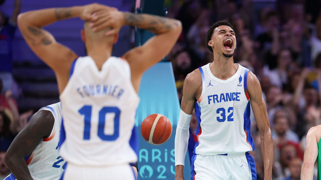 LILLE, FRANCE - JULY 27: Victor Wembanyama #32 of Team France reacts after a dunk during the Men's Group Phase - Group B game between France and Brazil on day one of the Olympic Games Paris 2024 at Stade Pierre Mauroy on July 27, 2024 in Lille, France.