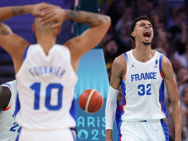 LILLE, FRANCE - JULY 27: Victor Wembanyama #32 of Team France reacts after a dunk during the Men's Group Phase - Group B game between France and Brazil on day one of the Olympic Games Paris 2024 at Stade Pierre Mauroy on July 27, 2024 in Lille, France.