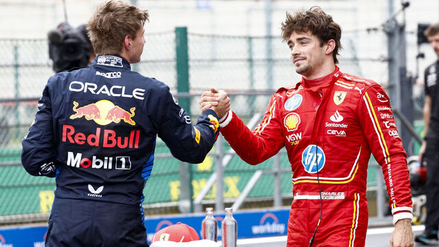 Red Bull Racing's Dutch driver Max Verstappen (L) shakes hands with Ferrari's Monegasque driver Charles Leclerc after the qualifying session ahead of the Formula One Belgian Grand Prix at the Spa-Francorchamps Circuit in Spa on July 27, 2024.