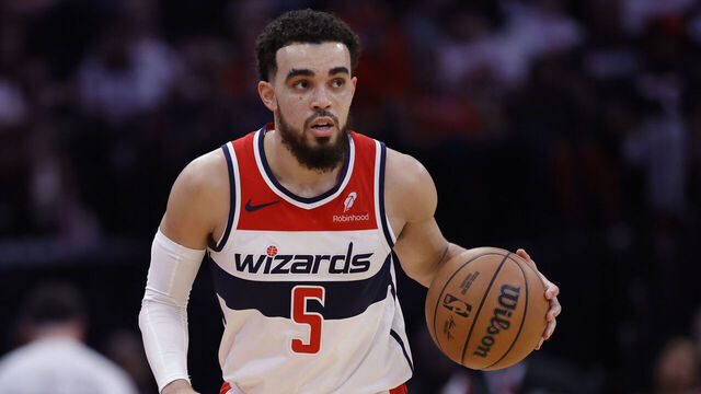 HOUSTON, TEXAS - MARCH 14: Tyus Jones #5 of the Washington Wizards in action against the Houston Rockets during the first half at Toyota Center on March 14, 2024 in Houston, Texas.