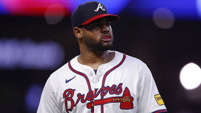 ATLANTA, GEORGIA - JULY 22: Reynaldo López #40 of the Atlanta Braves reacts during the sixth inning against the Cincinnati Reds at Truist Park on July 22, 2024 in Atlanta, Georgia.