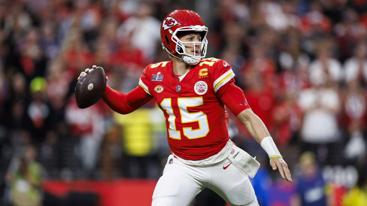 LAS VEGAS, NEVADA - FEBRUARY 11: Patrick Mahomes #15 of the Kansas City Chiefs rolls out and looks to throw a pass during Super Bowl LVIII against the San Francisco 49ers at Allegiant Stadium on February 11, 2024 in Las Vegas, Nevada.