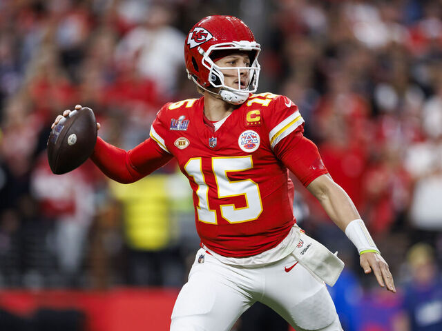 LAS VEGAS, NEVADA - FEBRUARY 11: Patrick Mahomes #15 of the Kansas City Chiefs rolls out and looks to throw a pass during Super Bowl LVIII against the San Francisco 49ers at Allegiant Stadium on February 11, 2024 in Las Vegas, Nevada.