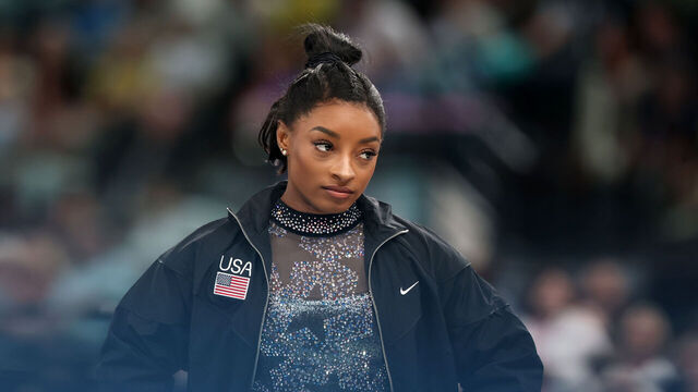 PARIS, FRANCE - JULY 28: Simone Biles of Team USA looks on before she competes on the beam during the Women's Artistic Gymnastics Qualification on day two of the Olympic Games Paris 2024 at Bercy Arena on July 28, 2024 in Paris, France.
