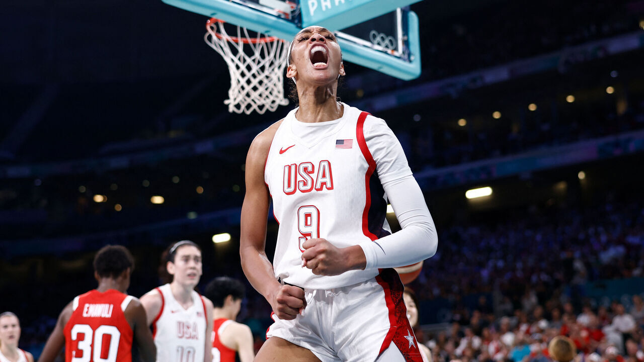 USA's #09 A'ja Wilson celebrates after scoring in the women's preliminary round group C basketball match between USA and Japan during the Paris 2024 Olympic Games at the Pierre-Mauroy stadium in Villeneuve-d'Ascq, northern France, on July 29, 2024.
