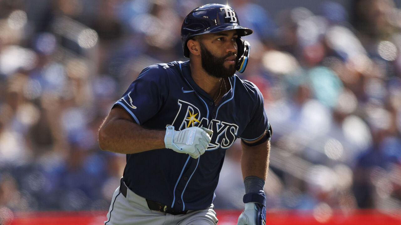 TORONTO, CANADA - JULY 25: Amed Rosario #10 of the Tampa Bay Rays runs out a double in the seventh inning of their MLB game against the Toronto Blue Jays at Rogers Centre on July 25, 2024 in Toronto, Ontario, Canada.