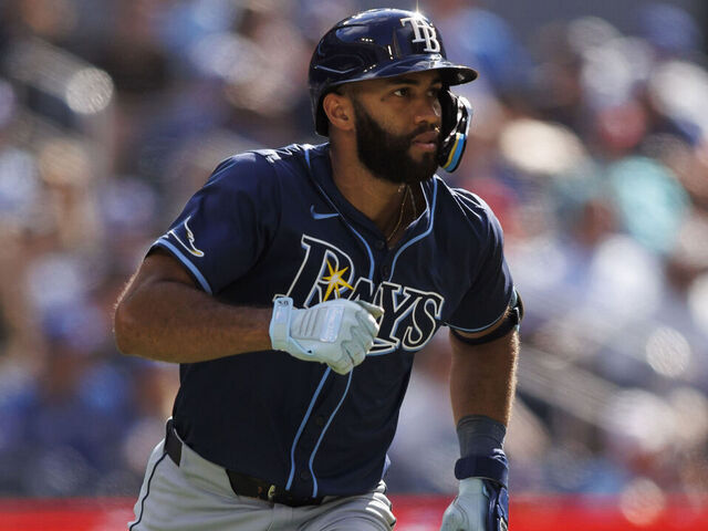TORONTO, CANADA - JULY 25: Amed Rosario #10 of the Tampa Bay Rays runs out a double in the seventh inning of their MLB game against the Toronto Blue Jays at Rogers Centre on July 25, 2024 in Toronto, Ontario, Canada.