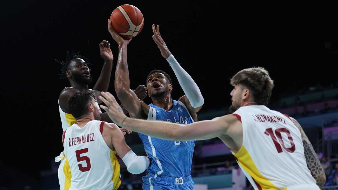 TOPSHOT - Greece's #34 Giannis Antetokounmpo takes a shot in the men's preliminary round group A basketball match between Spain and Greece during the Paris 2024 Olympic Games at the Pierre-Mauroy stadium in Villeneuve-d'Ascq, northern France, on July 30, 2024.