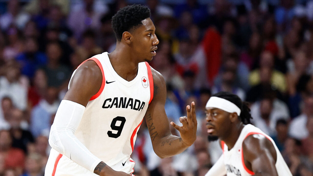 Canada's #09 Rj Barrett celebrates after scoring in the men's preliminary round group A basketball match between Canada and Australia during the Paris 2024 Olympic Games at the Pierre-Mauroy stadium in Villeneuve-d'Ascq, northern France, on July 30, 2024.