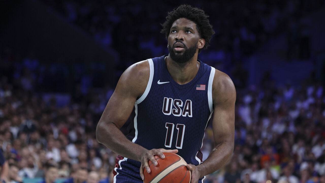 LILLE, FRANCE - JULY 28: Joel Embiid #11 of Team USA shoots a free throw during the Men's Group Phase - Group C match between Serbia and USA on Day 2 of the Olympic Games Paris 2024 at Stade Pierre Mauroy on July 28, 2024 in Lille, France.