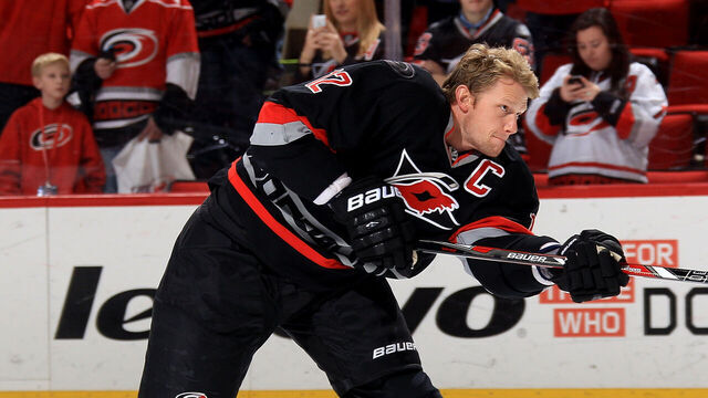 RALEIGH, NC - FEBRUARY 07: Eric Staal #12 of the Carolina Hurricanes shoots the puck during warmups prior to their NHL game against the Florida Panthers at PNC Arena on February 7, 2014 in Raleigh, North Carolina.