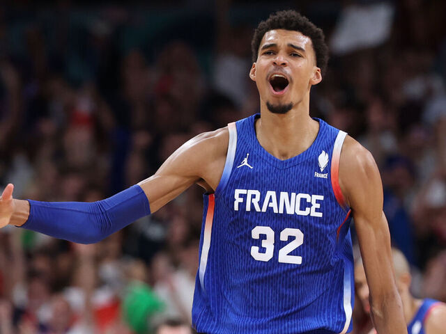 LILLE, FRANCE - JULY 30: Victor Wembanyama #32 of Team France reacts after making a three point basket during a Men's Group Phase-Group B match between Japan and France on day four of the Olympic Games Paris 2024 at Stade Pierre Mauroy on July 30, 2024 in Lille, France.