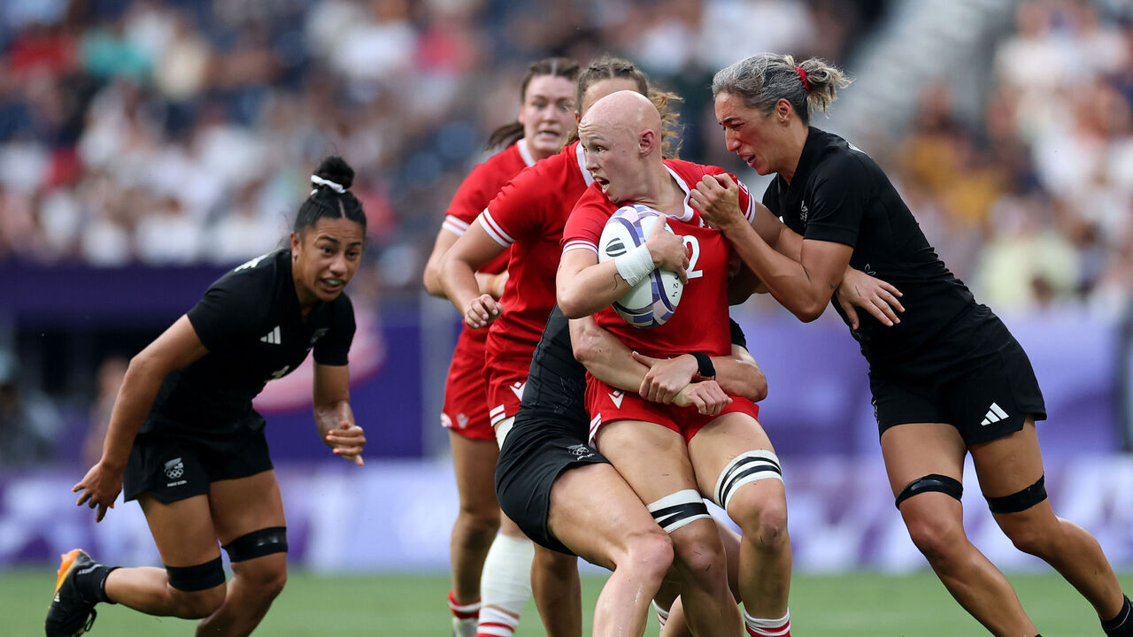 PARIS, FRANCE - JULY 30: Olivia Apps #2 of Team Canada is tackled by Sarah Hirini #5 of Team New Zealand during the Women's Rugby Sevens Gold medal match between Team New Zealand and Team Canada on day four of the Olympic Games Paris 2024 at Stade de France on July 30, 2024 in Paris, France.