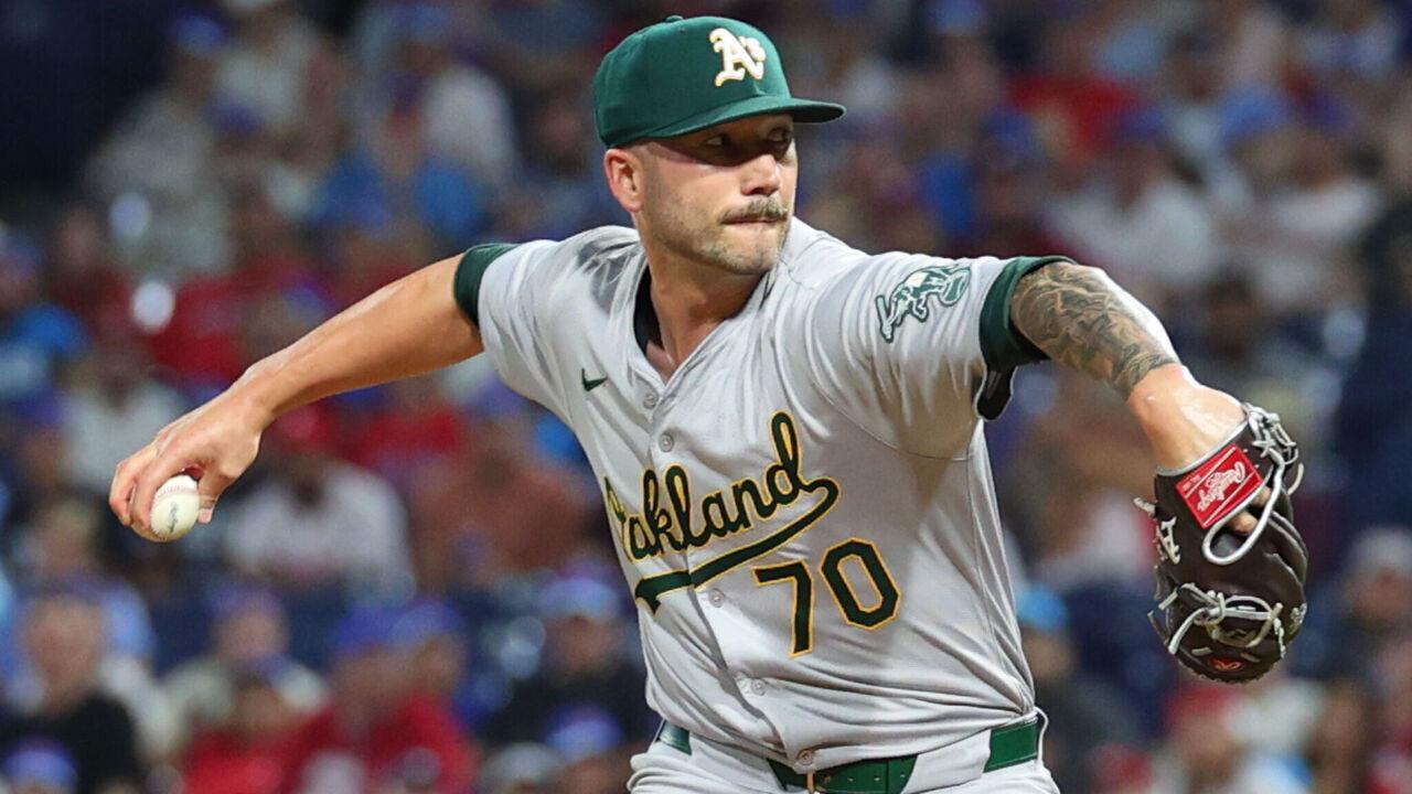 PHILADELPHIA, PENNSYLVANIA - JULY 12: Lucas Erceg #70 of the Oakland Athletics delivers a pitch against the Philadelphia Phillies during the eighth inning at Citizens Bank Park on July 12, 2024 in Philadelphia, Pennsylvania.