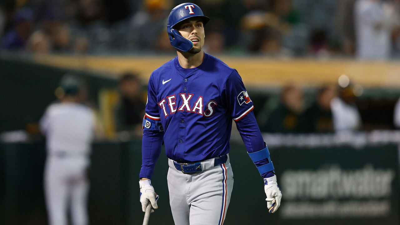 OAKLAND, CALIFORNIA - MAY 06: Evan Carter #32 of the Texas Rangers looks on after an at bat against the Oakland Athletics at Oakland Coliseum on May 06, 2024 in Oakland, California.