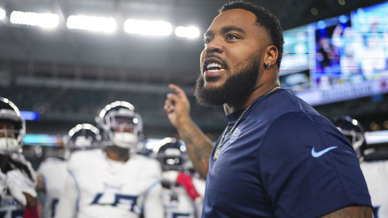 MIAMI GARDENS, FL - DECEMBER 11: Jeffery Simmons #98 of the Tennessee Titans leads a huddle prior to an NFL football game against the Miami Dolphins at Hard Rock Stadium on December 11, 2023 in Miami Gardens, Florida.
