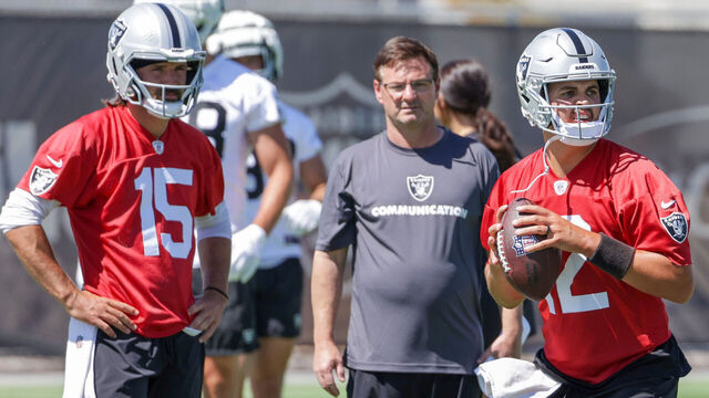 HENDERSON, NEVADA - JUNE 04: Quarterback Gardner Minshew #15 and quarterbacks coach Rich Scangarello of the Las Vegas Raiders watch as quarterback Aidan O'Connell #12 throws during an OTA offseason workout at the Las Vegas Raiders Headquarters/Intermountain Healthcare Performance Center on June 04, 2024 in Henderson, Nevada.