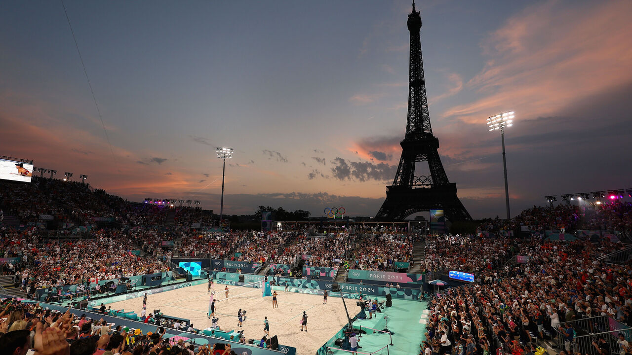 PARIS, FRANCE - JULY 30: A general view as Ana Patricia Silva Ramos and Eduarda Santos Lisboa of Team Brazil celebrate after defeating Team Spain during the Women's Preliminary Phase - Pool A match on day four of the Olympic Games Paris 2024 at Eiffel Tower Stadium on July 30, 2024 in Paris, France.