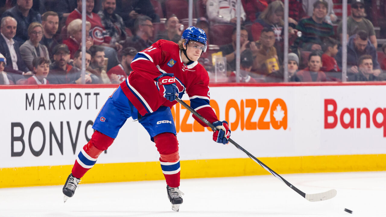 MONTREAL, CANADA - APRIL 4: Kaiden Guhle #21 of the Montreal Canadiens passes the puck during the first period of the NHL regular season game between the Montreal Canadiens and the Tampa Bay Lightning at the Bell Centre on April 4, 2024 in Montreal, Quebec, Canada. The Tampa Bay Lightning defeated the Montreal Canadiens by a score of 7-4.
