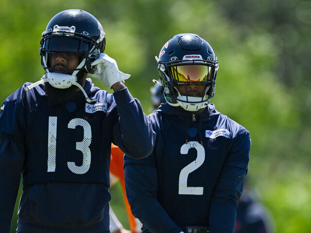 LAKE FOREST, ILLINOIS - JUNE 06: Rome Odunze #15, Keenan Allen #13, and DJ Moore #2 of the Chicago Bears practice during the Chicago Bears mandatory minicamp at Halas Hall on June 06, 2024 in Lake Forest, Illinois.