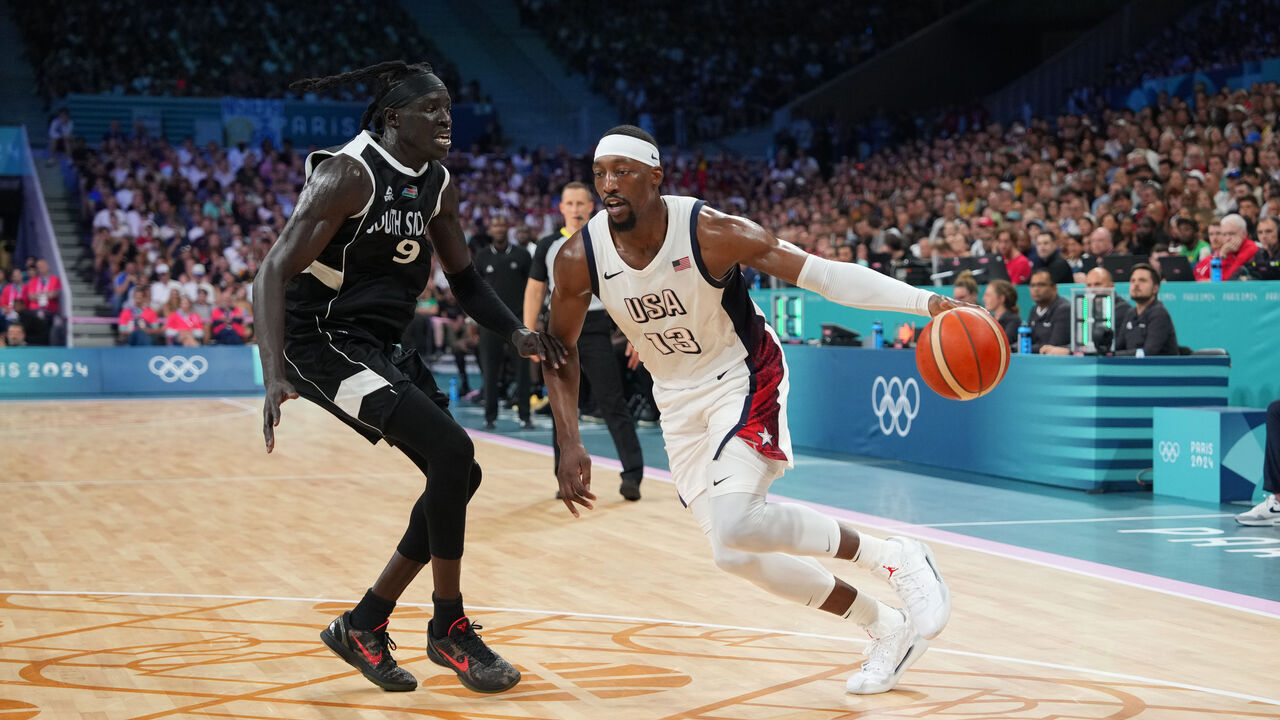 LILLE, FRANCE - JULY 31: Bam Adebayo #13 of the USA Men's National Team handles the ball during the game on July 31, 2024 at the Stade Pierre Mauroy in Paris, France. NOTE TO USER: User expressly acknowledges and agrees that, by downloading and/or using this photograph, user is consenting to the terms and conditions of the Getty Images License Agreement. Mandatory Copyright Notice: Copyright 2024 NBAE