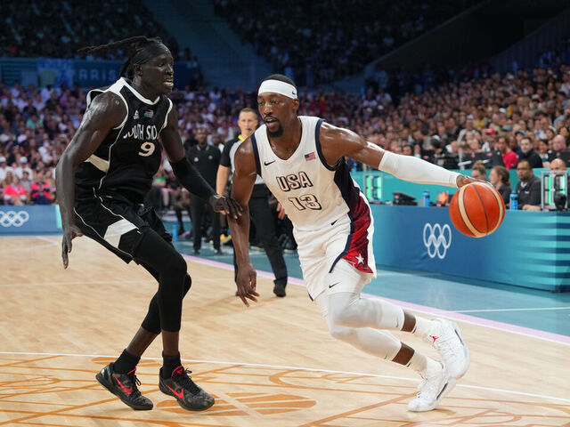 LILLE, FRANCE - JULY 31: Bam Adebayo #13 of the USA Men's National Team handles the ball during the game on July 31, 2024 at the Stade Pierre Mauroy in Paris, France. NOTE TO USER: User expressly acknowledges and agrees that, by downloading and/or using this photograph, user is consenting to the terms and conditions of the Getty Images License Agreement. Mandatory Copyright Notice: Copyright 2024 NBAE