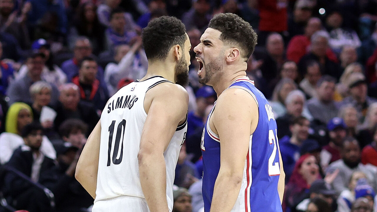 PHILADELPHIA, PENNSYLVANIA - JANUARY 25: Georges Niang #20 of the Philadelphia 76ers reacts by Ben Simmons #10 of the Brooklyn Nets during the fourth quarter at Wells Fargo Center on January 25, 2023 in Philadelphia, Pennsylvania.