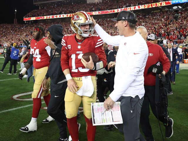 SANTA CLARA, CALIFORNIA - JANUARY 28: Brock Purdy #13 of the San Francisco 49ers celebrates with Head coach Kyle Shanahan after defeating the Detroit Lions 34-31 in the NFC Championship Game at Levi's Stadium on January 28, 2024 in Santa Clara, California.