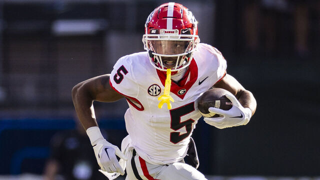 JACKSONVILLE, FLORIDA - OCTOBER 28: Rara Thomas #5 of the Georgia Bulldogs runs with the ball during the first half of a game against the Florida Gators at EverBank Stadium on October 28, 2023 in Jacksonville, Florida.