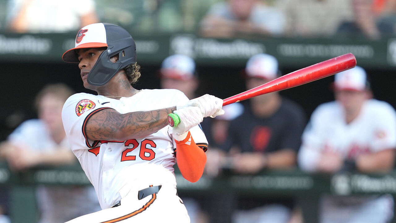 BALTIMORE, MD - JULY 29: Cristian Pache #26 of the Baltimore Orioles singles in the ninth inning during game one of a doubleheader against the Toronto Blue Jays at the Oriole Park at Camden Yards on July 29, 2024 in Baltimore, Maryland.