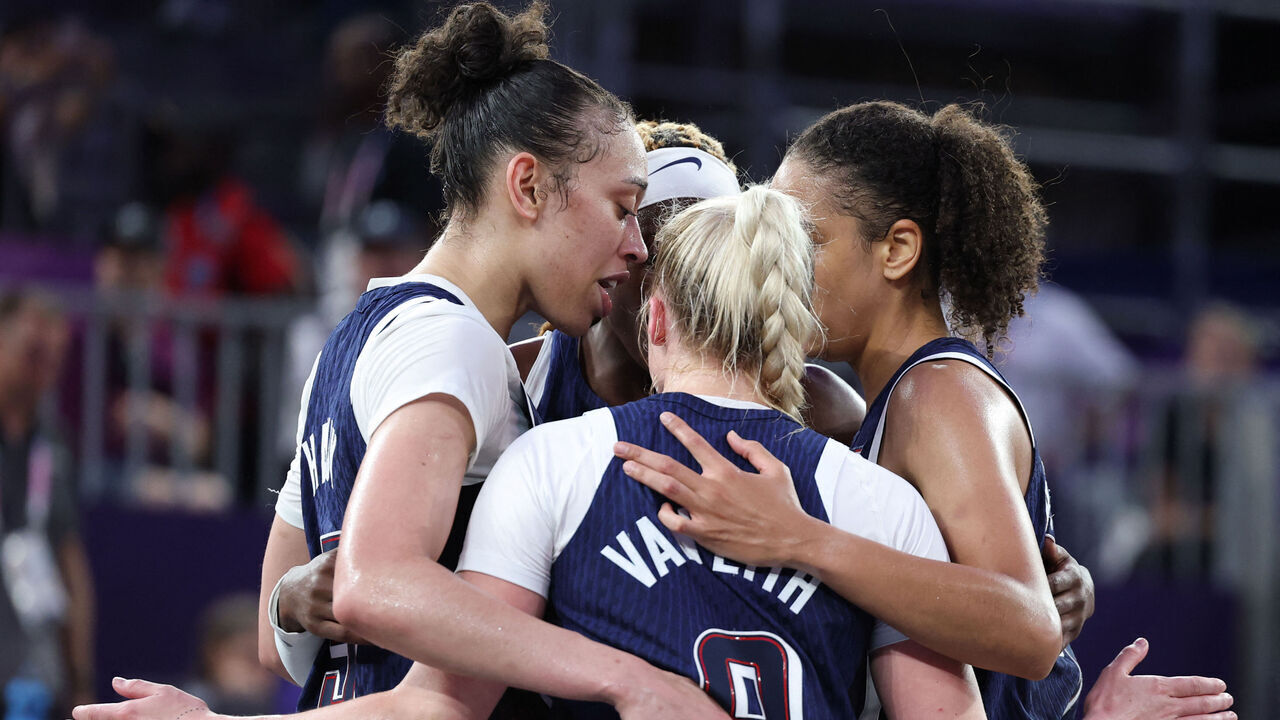 US' players celebrate winning the women's pool round 3x3 basketball game between Spain and the USA during the Paris 2024 Olympic Games at La Concorde in Paris on August 1, 2024.