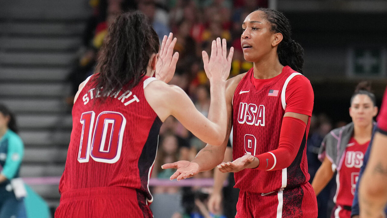 LILLE, FRANCE - AUGUST 1: Breanna Stewart #10 and A'ja Wilson #9 of the USA Women's National Team high five during the game against Team Belgium on August 1, 2024 at the Stade Pierre Mauroy in Paris, France. NOTE TO USER: User expressly acknowledges and agrees that, by downloading and/or using this photograph, user is consenting to the terms and conditions of the Getty Images License Agreement. Mandatory Copyright Notice: Copyright 2024 NBAE