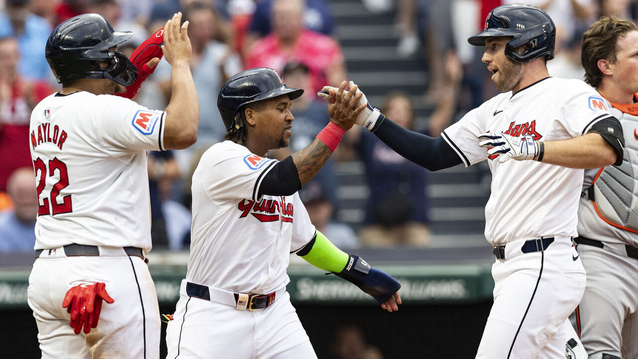 CLEVELAND, OHIO - AUGUST 1: David Fry #6 of the Cleveland Guardians celebrates with José Ramírez #11 and Josh Naylor #22 after hitting a three-run homer in the third inning of the game against the Baltimore Orioles at Progressive Field on August 1, 2024 in Cleveland, Ohio.