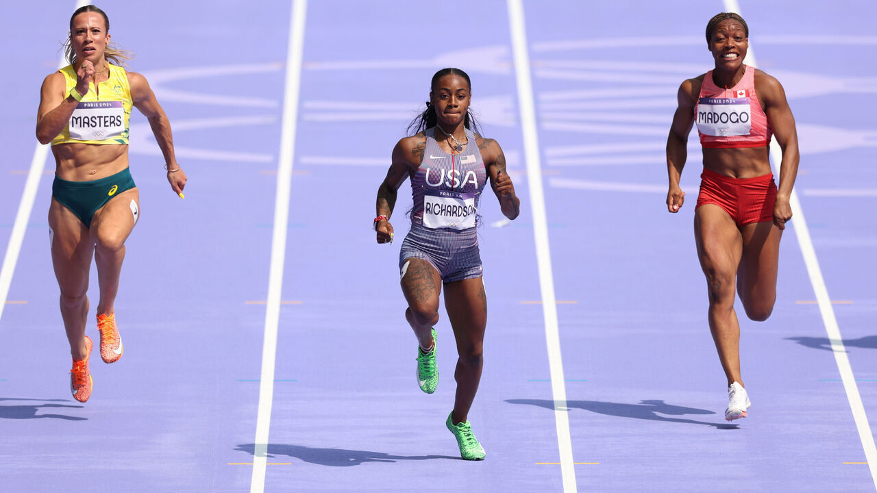 PARIS, FRANCE - AUGUST 02: Sha'carri Richardson of Team United States competes during the Women's 100m Round 1 on day seven of the Olympic Games Paris 2024 at Stade de France on August 02, 2024 in Paris, France.