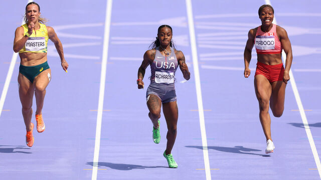 PARIS, FRANCE - AUGUST 02: Sha'carri Richardson of Team United States competes during the Women's 100m Round 1 on day seven of the Olympic Games Paris 2024 at Stade de France on August 02, 2024 in Paris, France.