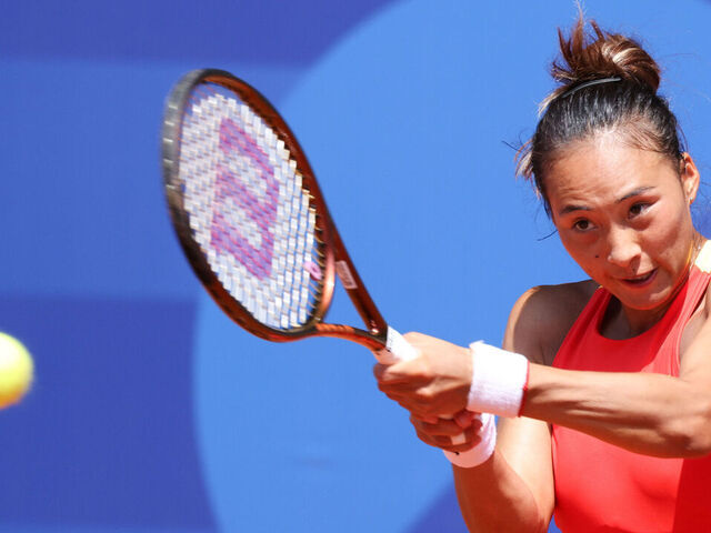 PARIS, FRANCE - AUGUST 01: Zheng Qinwen of Team China competes during the Tennis - Women's Singles Semifinal match against Iga Swiatek of Team Poland on day 6 of the Paris 2024 Olympic Games at Stade Roland-Garros on August 1, 2024 in Paris, France.