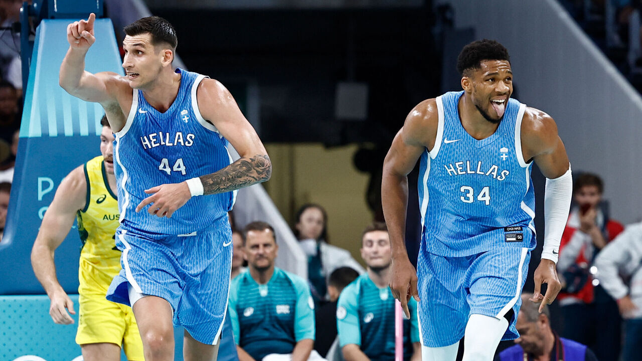 Greece's #34 Giannis Antetokounmpo celebrates after scoring in the men's preliminary round group A basketball match between Australia and Greece during the Paris 2024 Olympic Games at the Pierre-Mauroy stadium in Villeneuve-d'Ascq, northern France, on August 2, 2024.