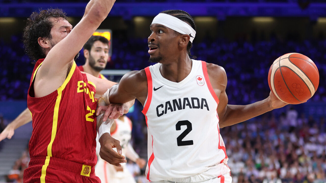 LILLE, FRANCE - AUGUST 02: Shai Gilgeous-Alexander #2 of Team Canada drives towards the basket during the Men's Group Phase - Group A game between Team Canada and Team Spain on day seven of the Olympic Games Paris 2024 at Stade Pierre Mauroy on August 02, 2024 in Lille, France.