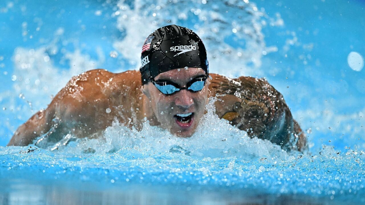 US' Caeleb Dressel competes in the semifinal of the men's 100m butterfly swimming event during the Paris 2024 Olympic Games at the Paris La Defense Arena in Nanterre, west of Paris, on August 2, 2024.