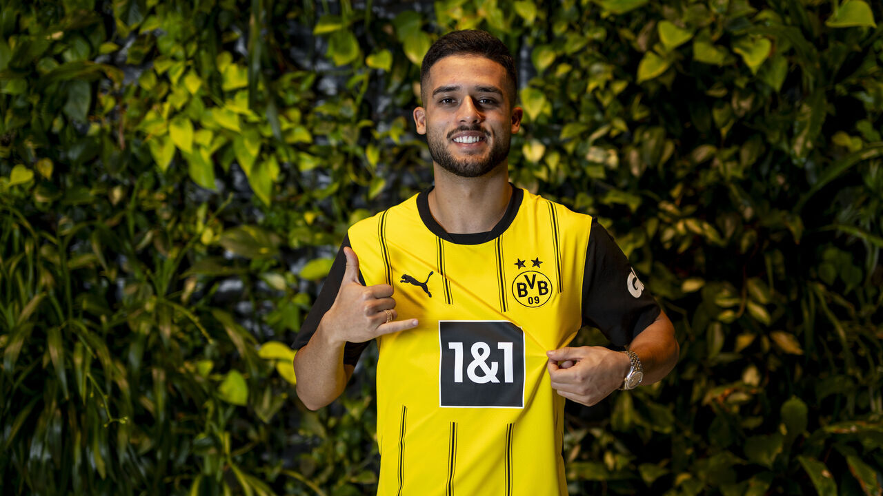 BAD RAGAZ, SWITZERLAND - AUGUST 2: Yan Couto of Borussia Dortmund poses after signing a contract with the club at the Borussia Dortmund Training Camp in Bad Ragaz on August 2, 2024 in Bad Ragaz, Switzerland.