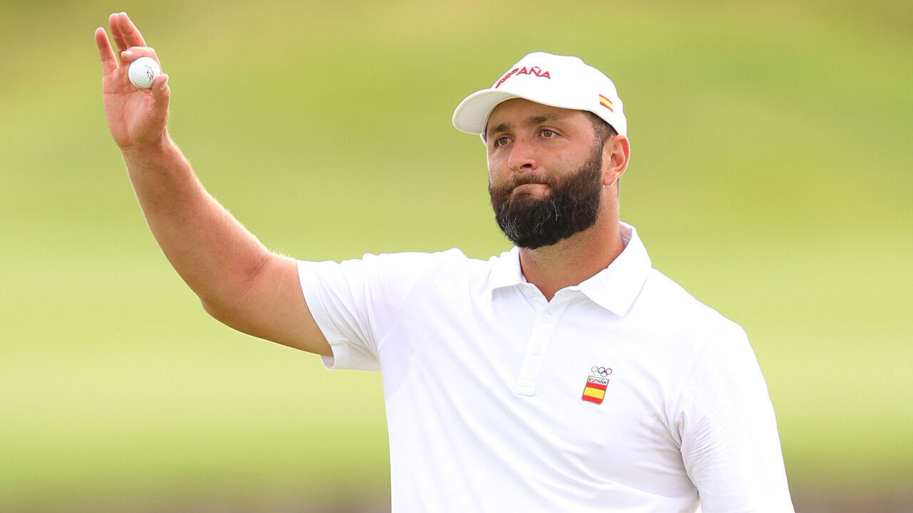 PARIS, FRANCE - AUGUST 03: Jon Rahm of Team Spain acknowledges the crowd on the 18th green during Day Three of the Men's Individual Stroke Play on day eight of the Olympic Games Paris 2024 at Le Golf National on August 03, 2024 in Paris, France.