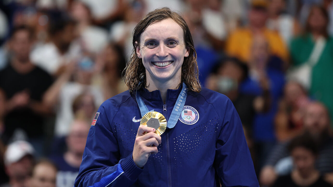 NANTERRE, FRANCE - AUGUST 03: Gold Medalist Katie Ledecky of Team United States poses on the podium during the Swimming medal ceremony after the Women's 800m Freestyle Final on day eight of the Olympic Games Paris 2024 at Paris La Defense Arena on August 03, 2024 in Nanterre, France.