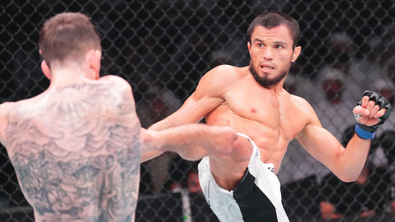 ABU DHABI, UNITED ARAB EMIRATES - AUGUST 03: (R-L) Umar Nurmagomedov of Russia kicks Cory Sandhagen in a bantamweight fight during the UFC Fight Night event at Etihad Arena on August 03, 2024 in Abu Dhabi, United Arab Emirates.