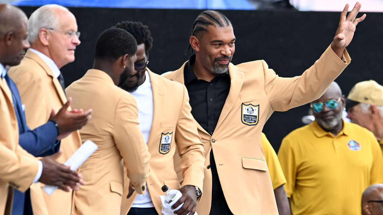 CANTON, OHIO - AUGUST 03: Julius Peppers is introduced during the 2024 Pro Football Hall of Fame Enshrinement Ceremony at Tom Benson Hall Of Fame Stadium on August 03, 2024 in Canton, Ohio.